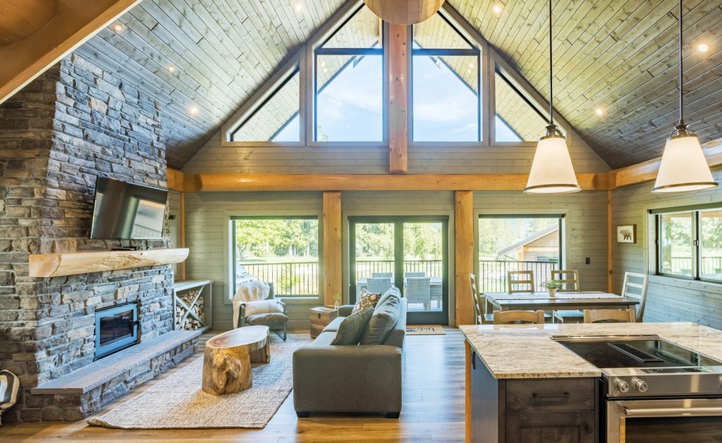 Open concept, large windows by Lacey Construction