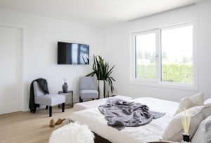 Bedroom in Linda Vista Net Zero Home by Hasler Homes Ltd.
