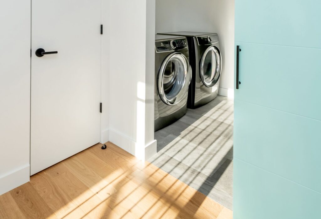 Sunny view of door and laundry room.