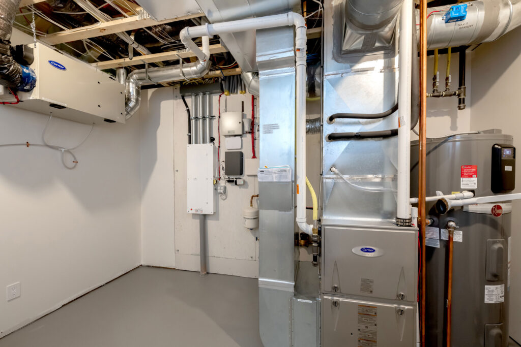 Mechanical room of a Net Zero Home by Maison Design + Build